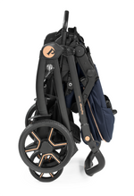 Load image into Gallery viewer, Peg Perego Book SLK Modular 3 in 1 travel system - Includes infant car seat, bassinet, toddler seat, nappy bag, and foot muff. Maneuverable on various surfaces. Available in South Africa with CB Baby.
